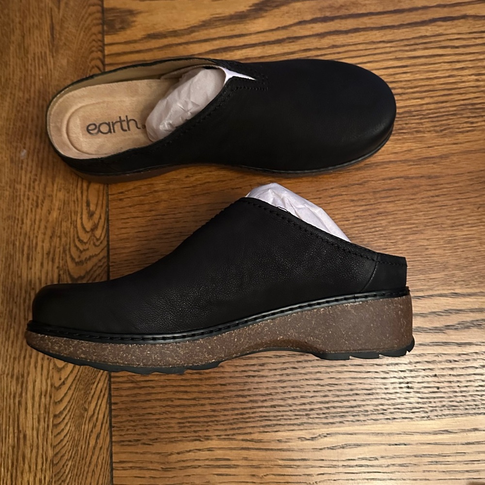 Earth brand clogs, new in box.  Size 8.5 wide.